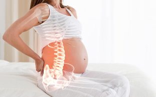 dor nas costas durante o embarazo causas